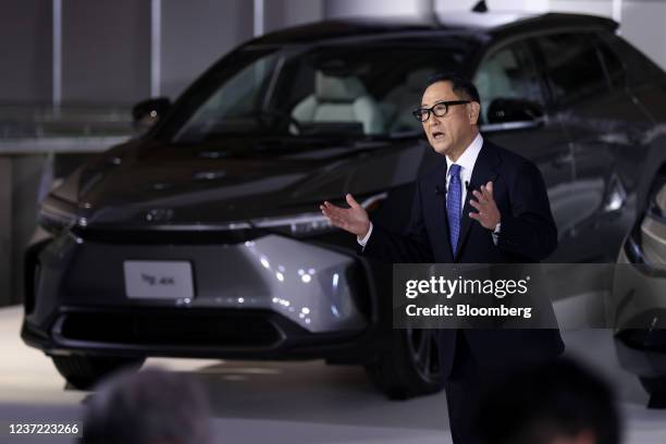 Akio Toyoda, president of Toyota Motor Corp., speaks in front of the company's bZ4X electric sport utility vehicle during a news conference at the...