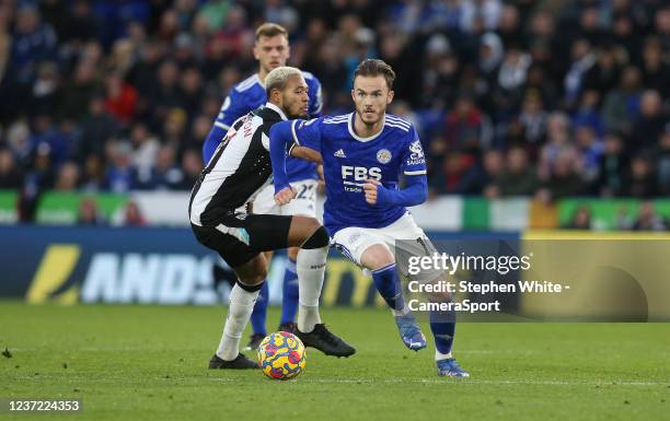 Leicester City's James Maddison runs past Newcastle United's Joelinton during the Premier League match between Leicester City and Newcastle United at...