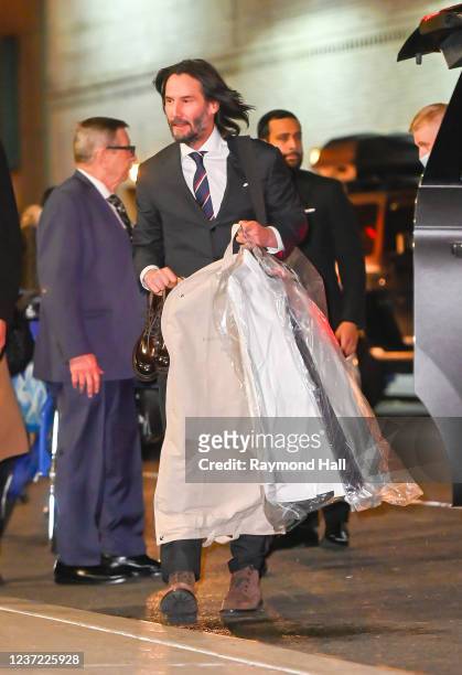 Keanu Reeves arrives at the Ed Sullivan theater for Stephen Colbert show on December 13, 2021 in New York City.