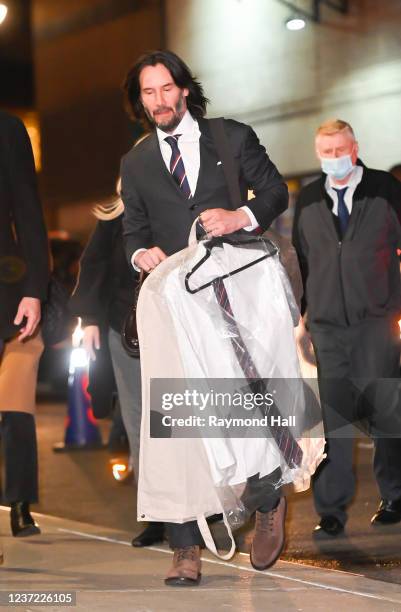 Keanu Reeves arrives at the Ed Sullivan theater for Stephen Colbert show on December 13, 2021 in New York City.