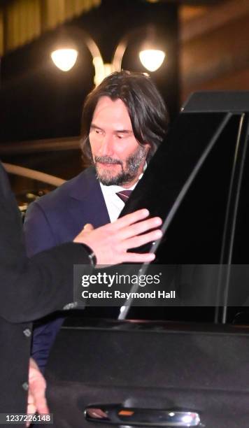 Keanu Reeves arrives at the Ed Sullivan theater for Stephen Colbert show on December 13, 2021 in New York City.