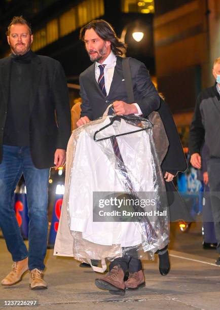 Keanu Reeves arrives at the Ed Sullivan theater for Stephen Colbert show on December 13, 2021 in New York City.