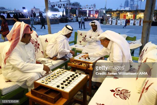 December 13 : Local men play the board game Dama, also known as Turkish draughts, played in the Middle East and the Mediterranean. Historically it...