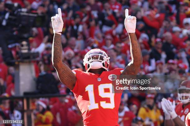 Kansas City Chiefs wide receiver Josh Gordon points to the sky to celebrate a 1-yard touchdown reception in the second quarter of an NFL game between...