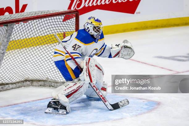 Goaltender Malcolm Subban of the Buffalo Sabres takes part in the pre-game warm up prior to NHL action against the Winnipeg Jets at the Canada Life...