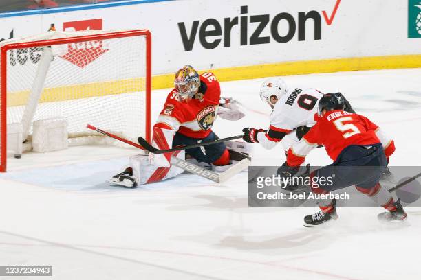 Josh Norris of the Ottawa Senators scores a second period goal past goaltender Spencer Knight of the Florida Panthers at the FLA Live Arena on...