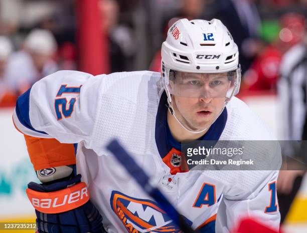 Josh Bailey of the New York Islanders lines up for a face-off during the second period of an NHL game against the Detroit Red Wings at Little Caesars...