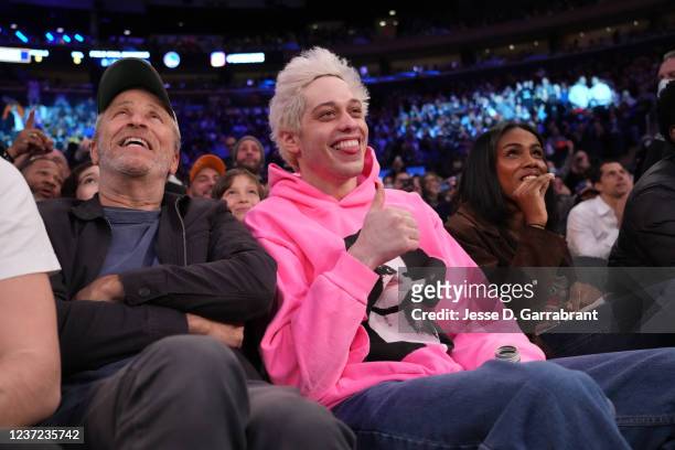 Celebrities Jon Stewart and Pete Davidson attend a game between the Golden State Warriors and the New York Knicks on December 14, 2021 at Madison...