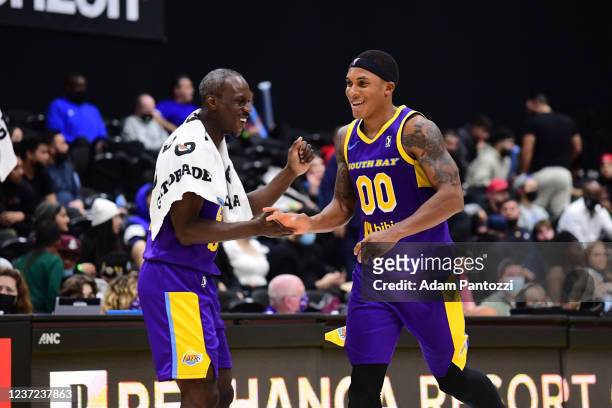 Andre Ingram of the South Bay Lakers celebrates with Nate Pierre-Louis of the South Bay Lakers during the game against the Agua Caliente Clippers on...