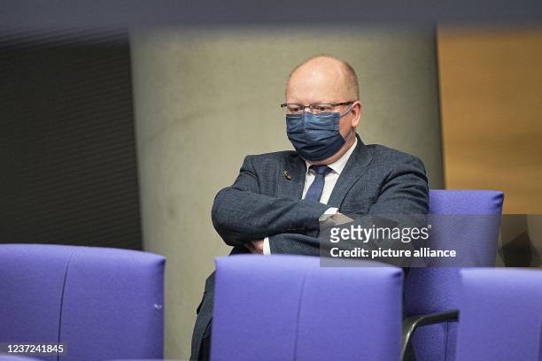 December 2021, Berlin: Stefan Seidler follows the debate in the Bundestag after Chancellor Scholz's first government statement. Photo: Michael...