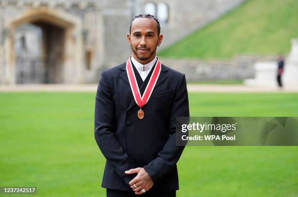 Sir Lewis Hamilton after he was made a Knight Bachelor by the Prince of Wales during a investiture ceremony at Windsor Castle on December 15, 2021 in...