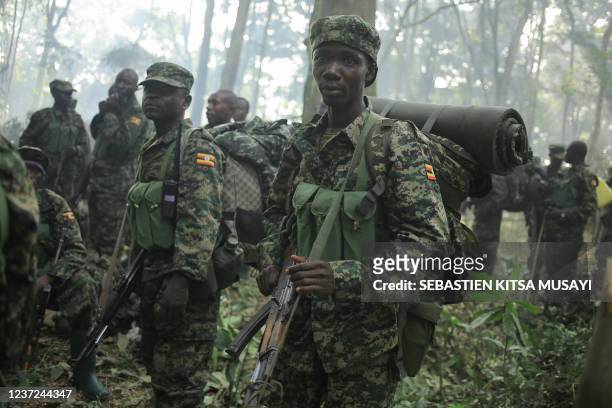 Ugandan People's Defence Forces soldiers patrol in the Virunga National Park on December 14, 2021. On December 14 the Ugandan army announced that it...