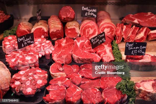 Cuts of beef on display in a butchers window at Borough Market in London, U.K., on Wednesday, Dec. 15, 2021. U.K. Inflation surged to its highest...