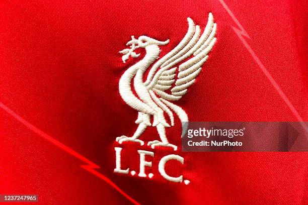 Liverpool Football Club logo is seen on a football jersey in a store in Krakow, Poland on December 15, 2021