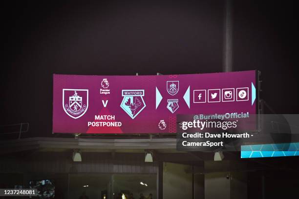 The announcement of the games postponement is displayed on the big screen at Turf Moor prior to the Premier League match between Burnley and Watford...