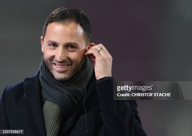 Leipzig's Italian-German head coach Domenico Tedesco is seen before an interview ahead of the start of the German first division Bundesliga football...