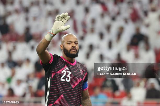 Algeria's goalkeeper Rais M'Bolhi gestures during the FIFA Arab Cup 2021 semi-final football match between Qatar and Algeria at the Al-Thumama...
