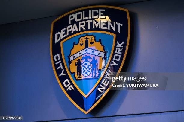New York City Police Department logo is seen at the precinct in Times Square on December 15, 2021 in New York City, New York.