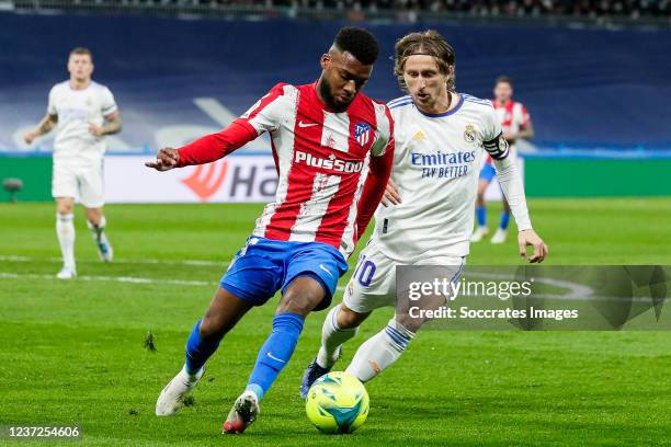 Thomas Lemar of Atletico Madrid, Luka Modric of Real Madrid during the La Liga Santander match between Real Madrid v Atletico Madrid at the Santiago...