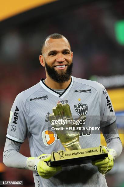 Atletico Mineiro's Everson poses with his award after his team won the 2021 Brazil Cup second leg final football match against Athletico Paranaense...