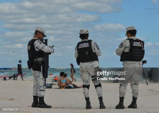 Members of the National Guard patrol Playa Pescadores in Tulum . According to security reports three recent military attacks on Mexico's top tourist...
