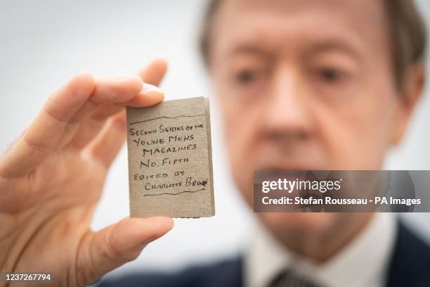 Newspaper editor and Chairman of the Friends of the national Libraries, Geordie Grieg holds one of Charlotte Bronte's 'little books, which forms part...