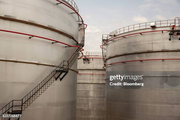 Fuel storage tanks at the Mahathi Infra Uganda Ltd. Oil logistics complex on the shore of Lake Victoria in Entebbe, outside Kampala, Uganda, on...