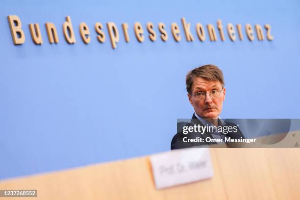 German Health Minister Karl Lauterbach speaks to the media following Germany's recent launch of vaccinations against Covid-19 for children aged 5-11...