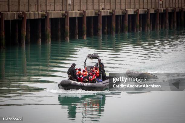 Asylum seekers arriving into Dover docks on board a Border Force RIB boat after being rescued in the English Channel while crossing on the 16th of...