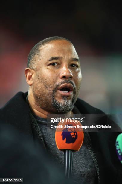 Pitchside pundit John Barnes during the Premier League match between Liverpool and Newcastle United at Anfield on December 16, 2021 in Liverpool,...