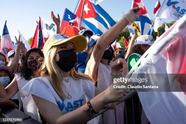 Supporters of José Antonio Kast candidate for the Partido Republicano wave flags prior the closing rally ahead of Sunday Presidential run-off at...