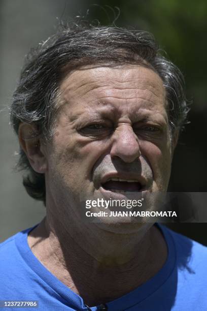 Argentine saver Ricardo Llados --a victim of the 2001 economic crisis-- talks with AFP at Plaza de Mayo square in Buenos Aires on December 2, 2021. -...