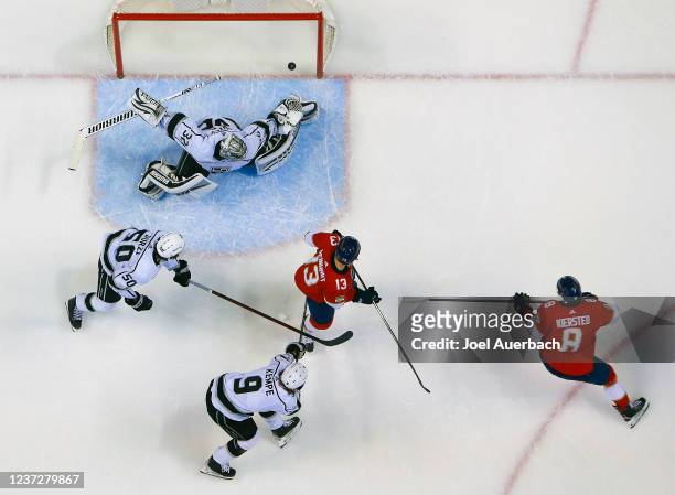 Matt Kiersted of the Florida Panthers scores his first NHL goal against goaltender Jonathan Quick of the Los Angeles Kings during first period action...