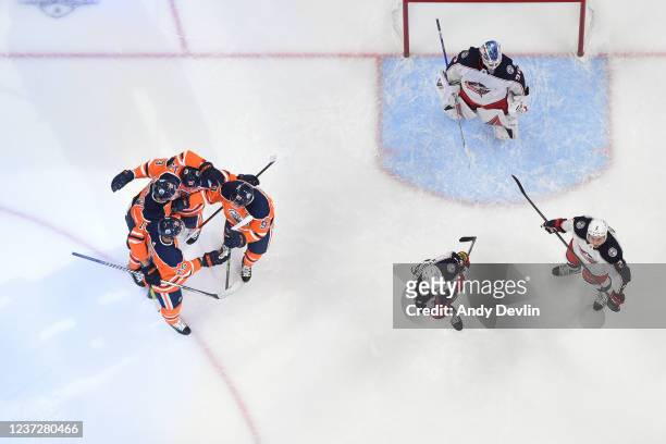 Darnell Nurse, Jesse Puljujarvi, Ryan Nugent-Hopkins and Connor McDavid of the Edmonton Oilers celebrate after a goal during the game against the...