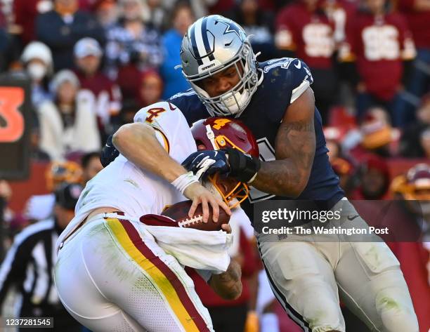 Dallas Cowboys outside linebacker Micah Parsons sacks Washington Football Team quarterback Taylor Heinicke in the second quarter of the game between...