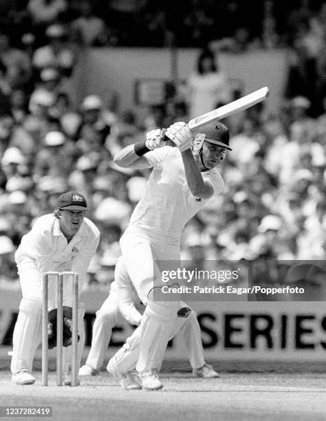 Chris Broad of England driving during his innings of 112 in the 4th Test match between Australia and England at the MCG, Melbourne, Australia, 27th...