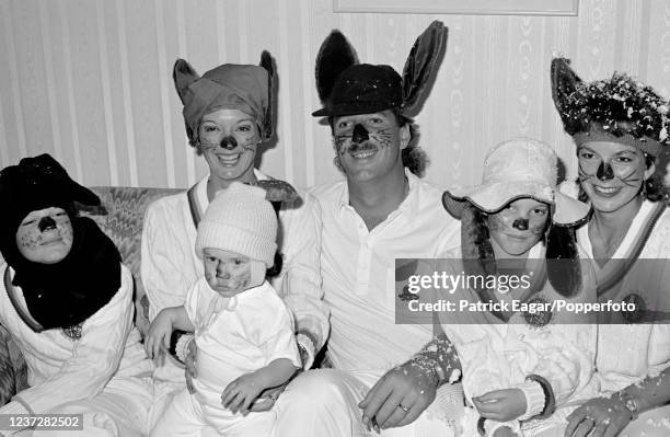 Ian Botham of England with his wife Kathy and children Liam, Sarah and Becky in fancy dress as Bunbury bunnies for the England cricket team's...