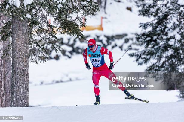 Andrey Melnichenko of Russia in action competes during the 15km Men at the FIS World Cup Cross-Country Davos on December 12, 2021 in Davos,...