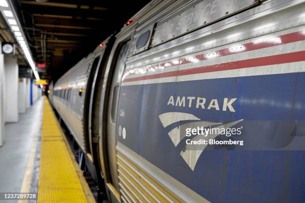 An Amtrak train in New York Penn Station in Newark, New Jersey, U.S., on Thursday, Dec. 16, 2021. Amtrak's $12.3 billion plan to build a new...