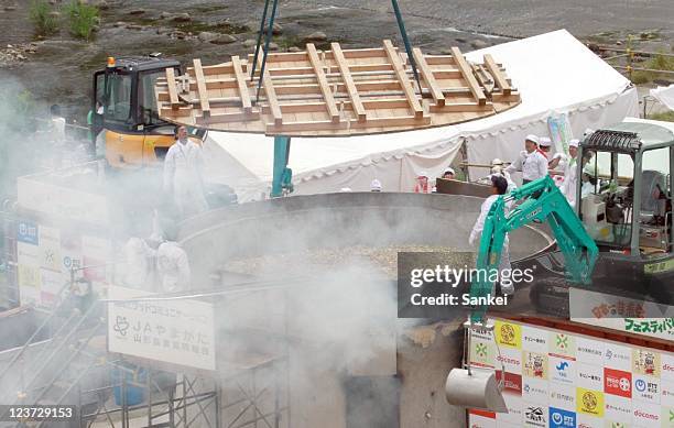 Japan's Largest "Imoni-Kai" Festival that is eating stewed potatoes takes place at the foot of Sotsuki Bridge on September 4, 2011 in Yamagata,...