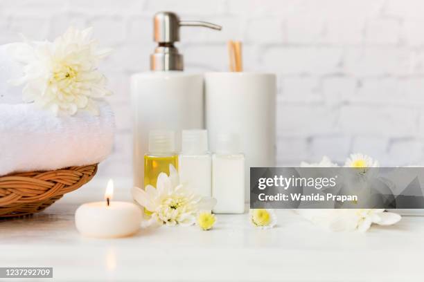 spa beauty massage health wellness background.  spa thai therapy treatment aromatherapy for body woman with white flower nature candle for relax and summer time.  lifestyle and cosmetic concept - candle white background stock-fotos und bilder