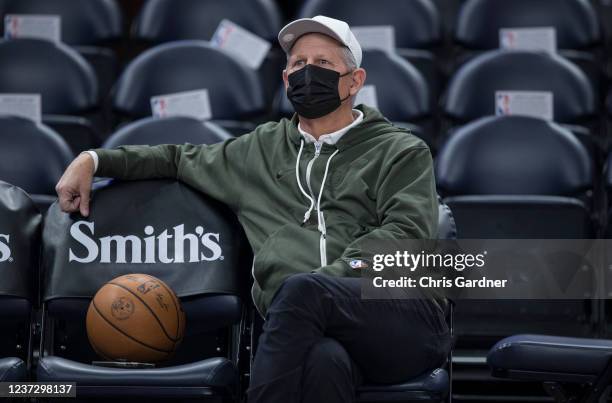 Newly hired alternate governor and CEO of basketball operations Danny Ainge of the Utah Jazz watches warm-up before the start of their game against...