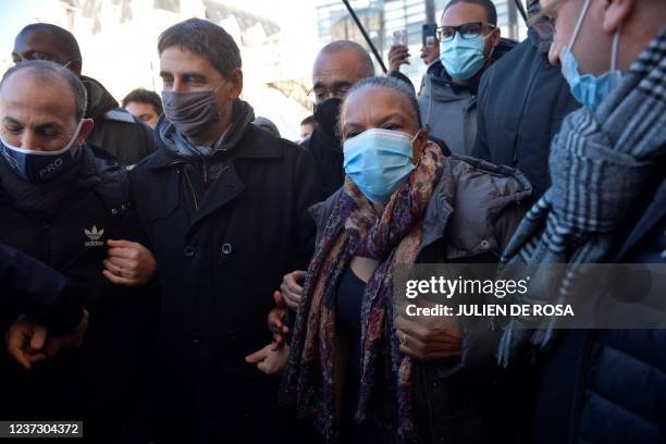 Former French Justice Minister Christiane Taubira stands next to Saint-Denis Mayor Mathieu Hanotin during a visit in Saint-Denis, near Paris, on...