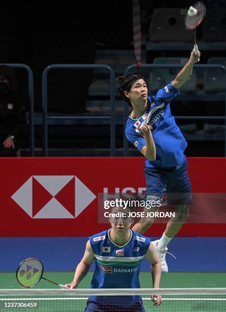 Japan's Yuta Watanabe and Japan's Arisa Higashino hit a shot to Japan's Kyohel Yamashita and Japan's Naru Shiyona during the mixed doubles semi-final...