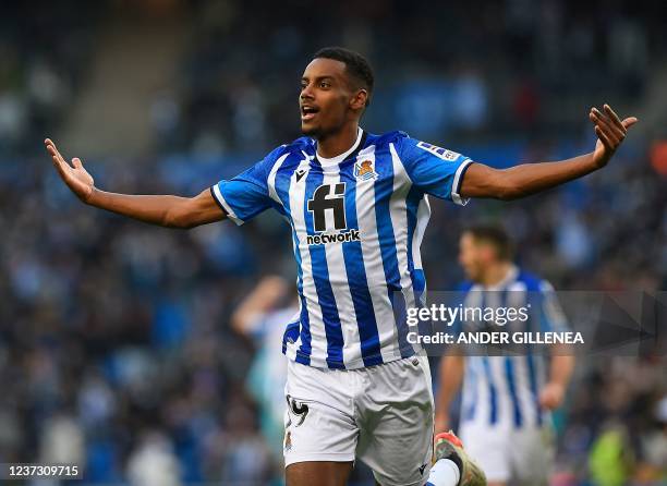 Real Sociedad's Swedish forward Alexander Isak celebrates scoring his team's first goal during the Spanish league football match between Real...