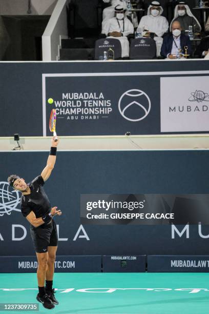 Spain's Rafael Nadal returns the ball to Canada's Denis Shapovalov , as Spain's former king Juan Carlos watches behind, during the third-place...