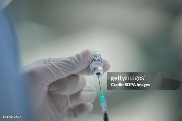 Health worker prepares to administer a dose of Pfizer-BioNTech Covid-19 vaccine at the Bang Sue Grand Station, Bangkok. Thailand has accelerated...
