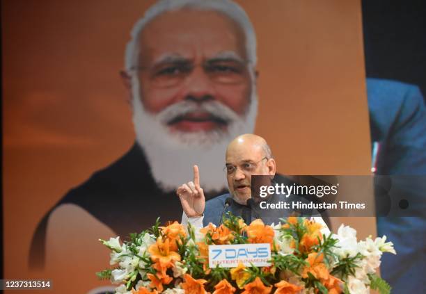 Home minister Amit Shah addresses the crowd during the UP Cooperative Bank program at the Indira Gandhi Foundation ceremony on December 17, 2021 in...
