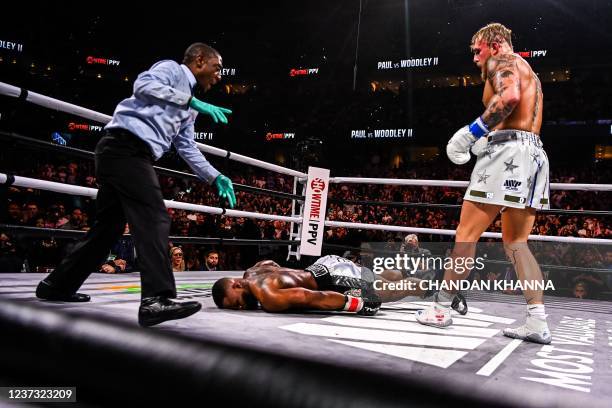 YouTube personality Jake Paul knocks out former UFC welterweight champion Tyron Woodley in an eight-round cruiserweight bout at the Amalie Arena in...