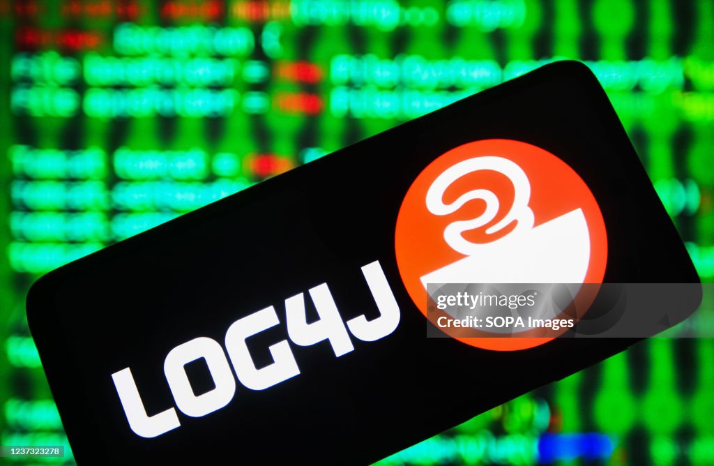 In this photo illustration, Apache Log4j logo of a Java-...